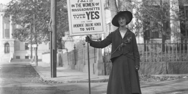 historical image of woman with vote sign