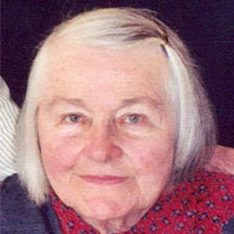 Photograph Of Mary Ricketson Bullard - A Headshot Of An Older Woman With Shoulder Length Grey Hair Pinned Back