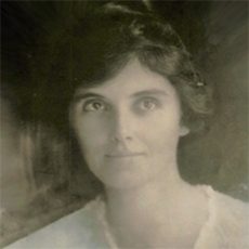 Photograph Of Alberta Simmons Brownell -- The Of Face Of A Woman With Short Dark Hair Wearing A Light Top With A Slightly V-shaped Neckline.
