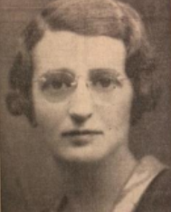 Photo Of Sylvia Finger - A Headshot Of A Woman With Short Brown Hair And Round Glasses