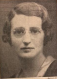 Photo Of Sylvia Finger - A Headshot Of A Woman With Short Brown Hair And Round Glasses