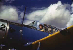 Photograph of Lillian Yonally sitting in cockpit